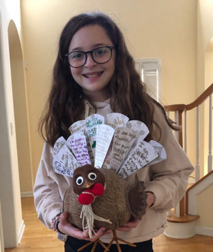 Photo of girl posing with turkey