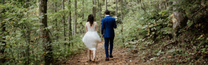Kari and Robert walking in the woods